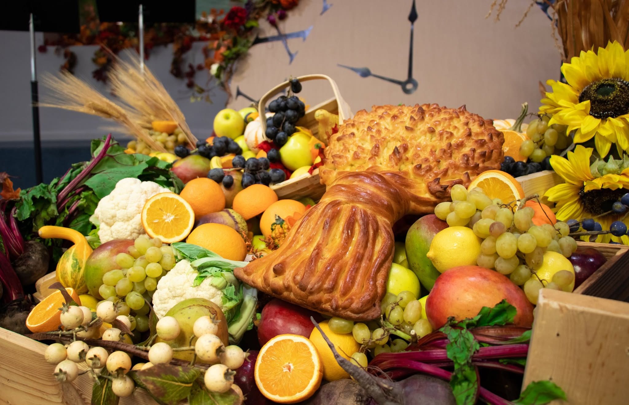 Bread, fruit, and fall decorations prepared for the Harvest Festival at Spasenie Church